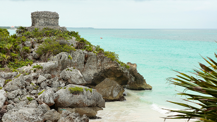 Explore the ancient ruins in Tulum, Mexico.
