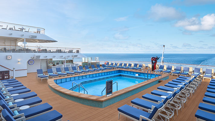 Soak up the sun next to the onboard pool oasis.
