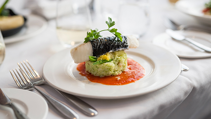 Indulge in delicious cuisine onboard with GoldLeaf Service. 